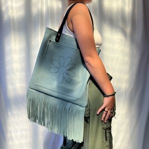 Handmade leather fringe tote bag